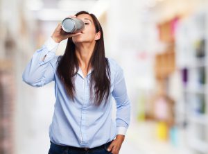 woman drinking soda