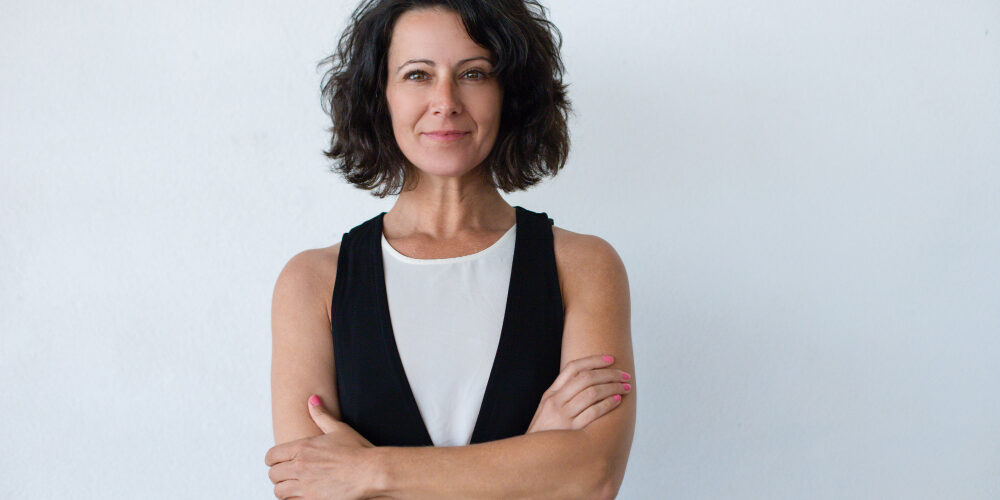 cheerful-middle-aged-woman-with-curly-hair